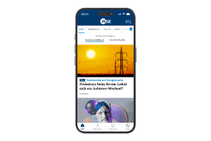 Smartphone mit geöffneter NOZ-App zeigt Nachrichtenübersicht mit Artikeln und Bildern auf dem Display.